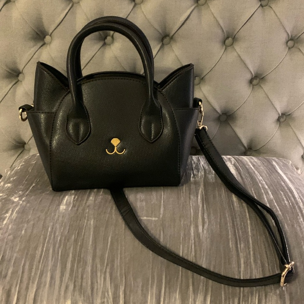 Black cat purse with top handle and adjustable shoulder strap